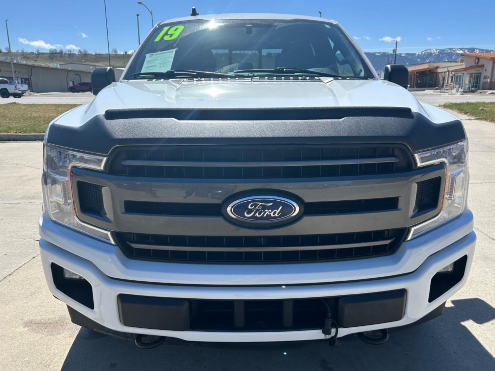 2019 White /BLACK Ford F-150 XLT SuperCrew 6.5-ft. Bed 4WD (1FTEW1E47KF) with an 3.5L V6 TURBO engine, 6A transmission, located at 3030 CY Ave, Casper, WY, 82604, (307) 265-3830, 42.827816, -106.357483 - Check out this beauty! It has the FX4 Off-Road Package, with remote start, and heated seats. Come see how to get into this truck, and be able to off-road with style! - Photo #2